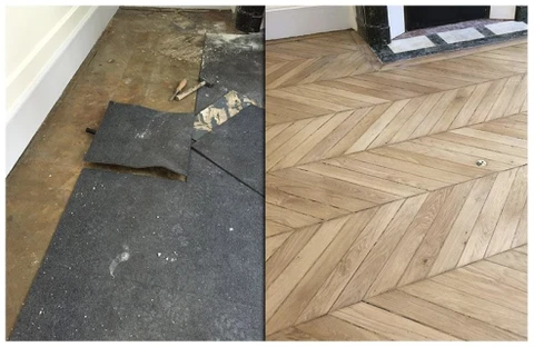 Intérieur en cours de rénovation avec sol partiellement démoli révélant le support béton brut et débris de revêtement noir arraché