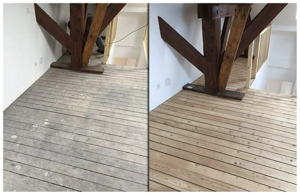 Hall d'entrée moderne avec portes vitrées ornées de motifs géométriques en verre coloré et panneaux de bois